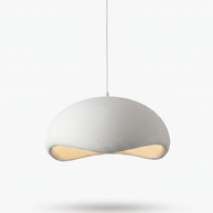 Nuvola cloud pendant glowing warm in an evening interior (accepted 4:5 crop)