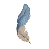 Comvilo Feather Wall Lamp in the blue and cream finish, vertical orientation, shown on a plain background