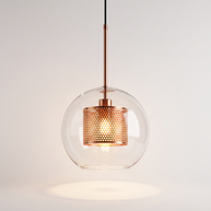 Comvilo Chiswick Glass Pendant Light illuminated, warm glow through the perforated copper drum