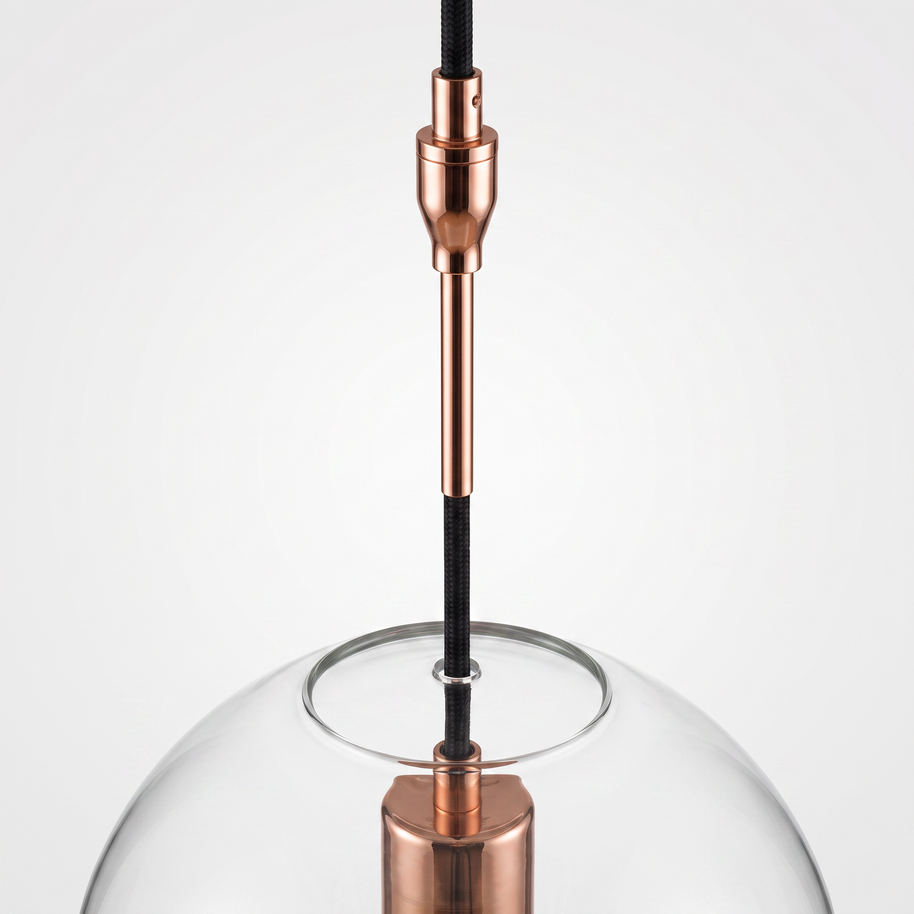 Detail of the copper suspension stem and cord connection above the glass sphere