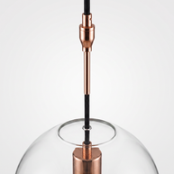 Detail of the copper suspension stem and cord connection above the glass sphere
