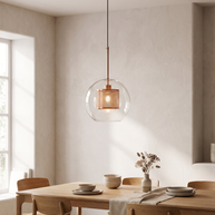 Chiswick Glass Pendant Light hanging above a dining table in daylight