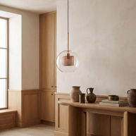 Chiswick Glass Pendant Light beside an oak console in a bright interior
