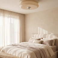 Marais ceiling light centered above a bed in a bright bedroom