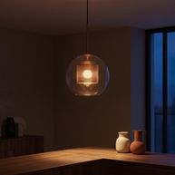 Chiswick Glass Pendant Light glowing over a walnut sideboard at dusk