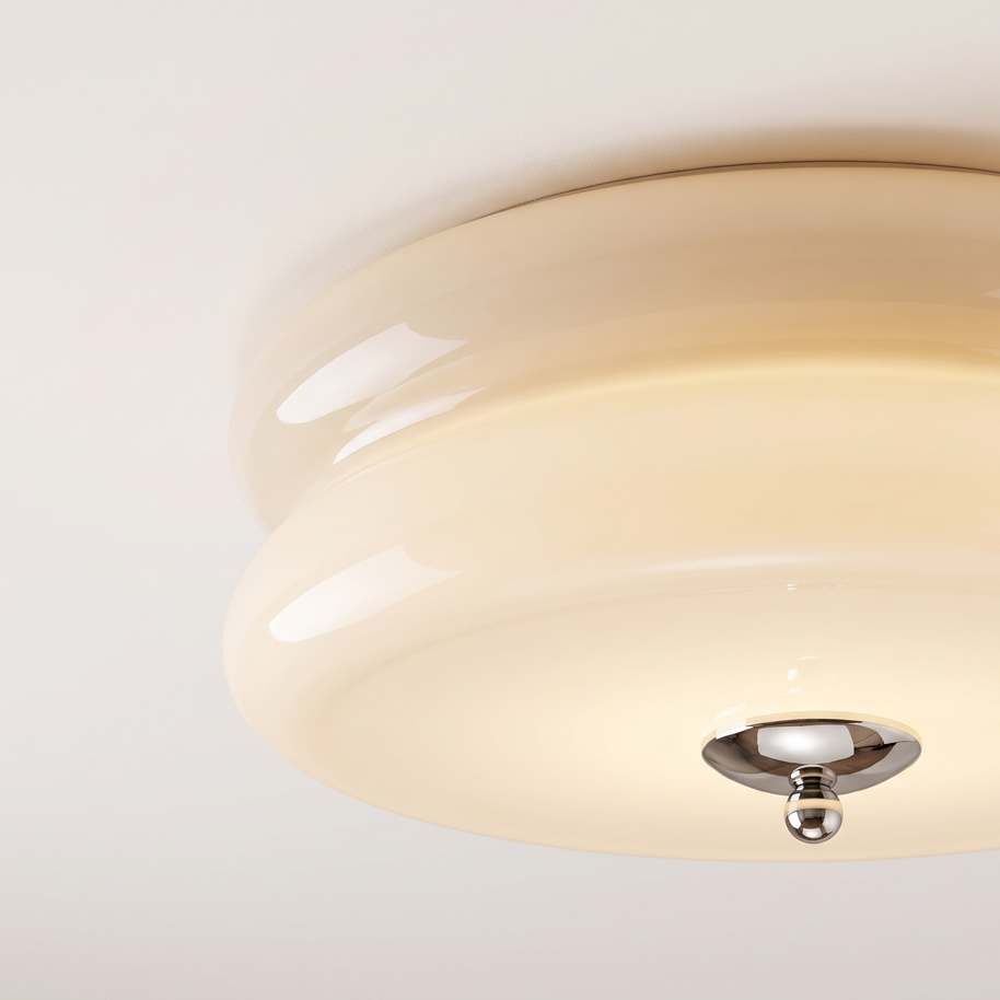 Detail of the flush ceiling junction and chrome finial