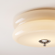 Detail of the flush ceiling junction and chrome finial