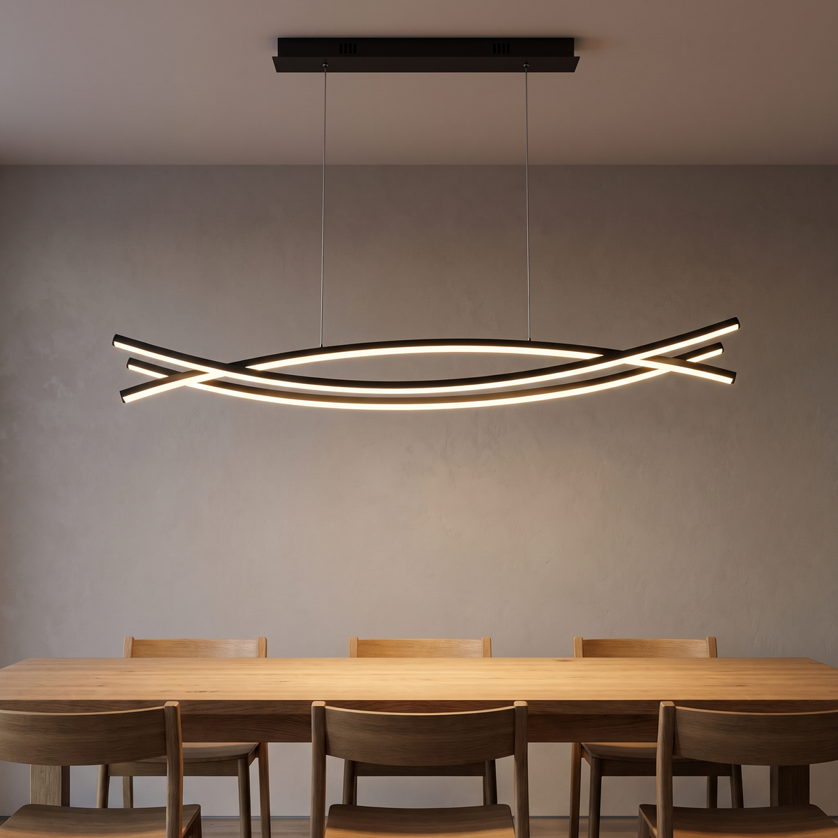 Quenvale black linear pendant with crossing lit wave bars, suspended on slim cables from a black ceiling bar.