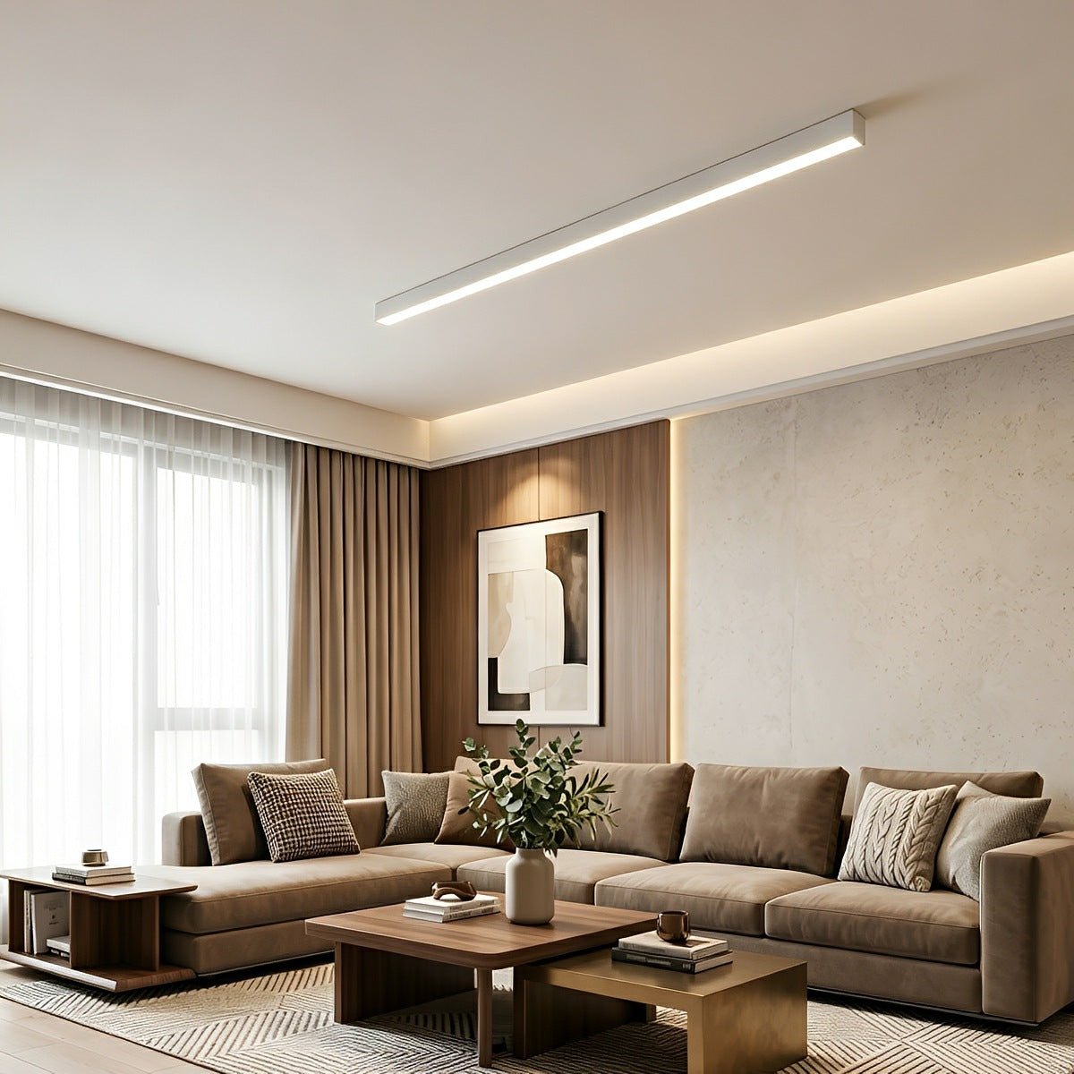 Slim linear LED ceiling light with a white body, fitted across a living room ceiling.
