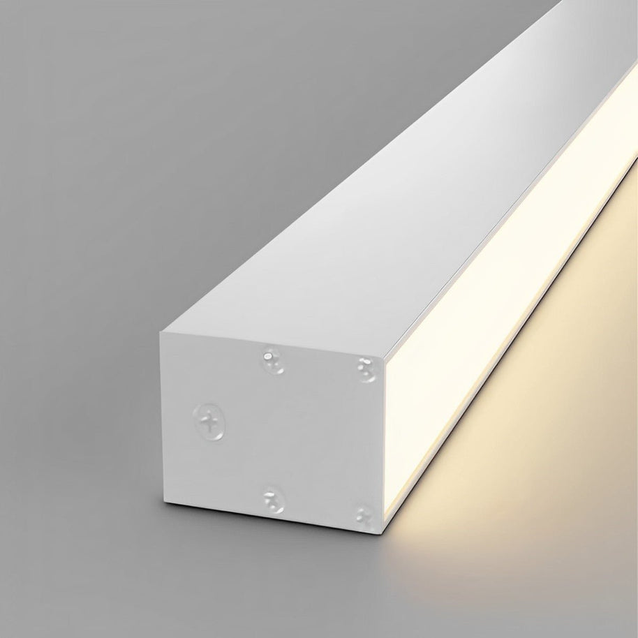 Close view of the white light at an angle, showing the housing end and the lit face.