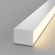 Close view of the white light at an angle, showing the housing end and the lit face.