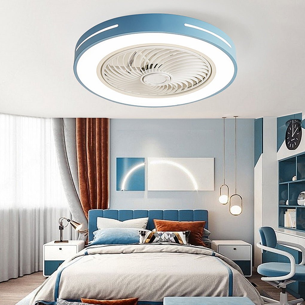 Flush-mount ceiling fan with an enclosed blade cage and a lit ring, blue outer rim, fitted to a bedroom ceiling in a blue and white room.