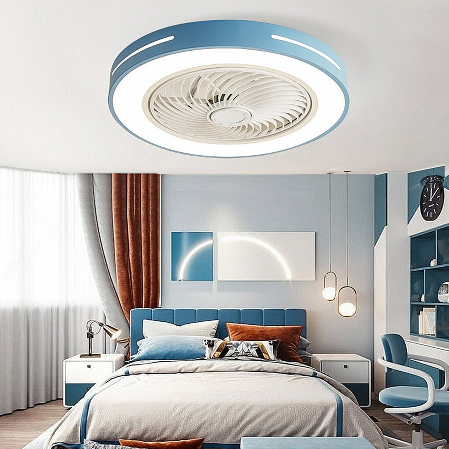 Flush-mount ceiling fan with an enclosed blade cage and a lit ring, blue outer rim, fitted to a bedroom ceiling in a blue and white room.
