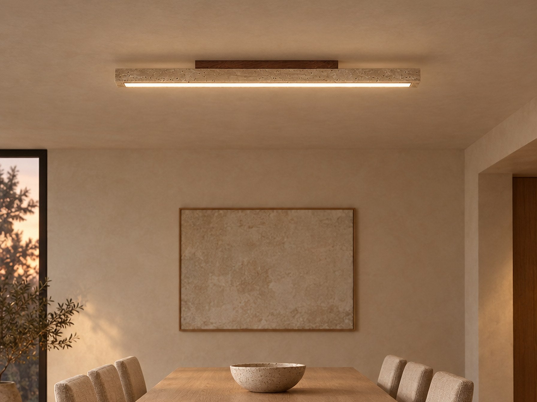 Travellin Ceiling Light, travertine bar on a dark walnut block, lit on a dining room ceiling